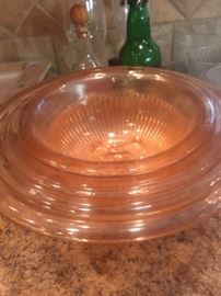 Mixing bowls - pink depression glass - set of (4) and one extra large size one