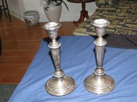 WEIGHTED STERLING CANDLE STICKS.