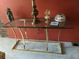 $50  Glass top console table with brass base