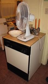 This dishwasher can roll around the kitchen as needed.