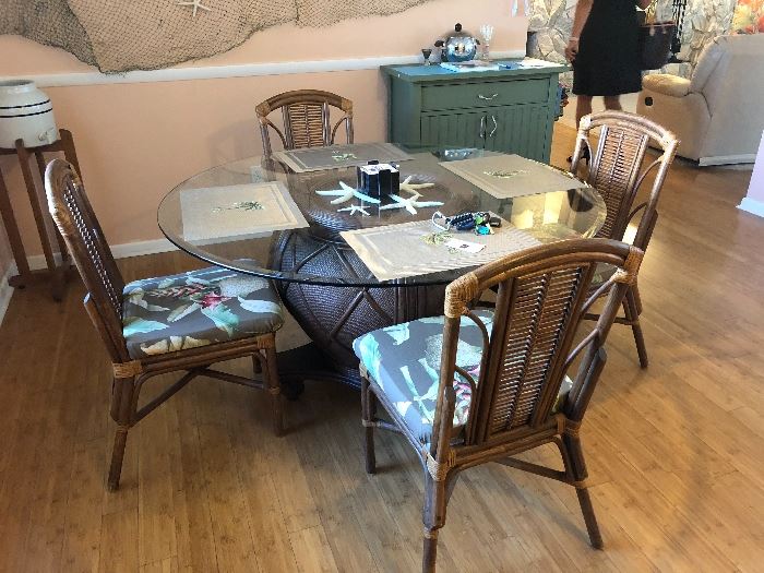 Dining room table with glass top and 4 chairs