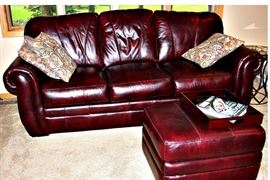 Leather sofa - has matching chair and ottoman.