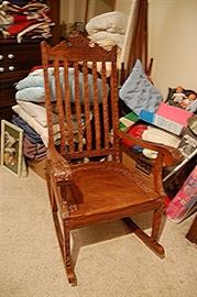 Unusual carved ebony rocker
