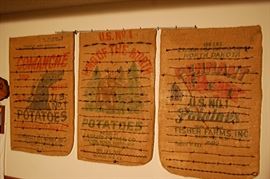 Barbed wire collection on burlap advertising sacks