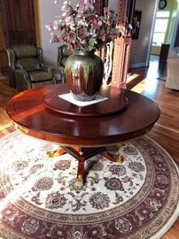Ornate claw foot Antique round table with Lazy Susan & vase with flowers