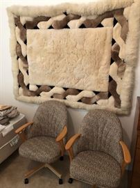 Kitchen chairs on wheels, sheepskin rug/wall hanging
