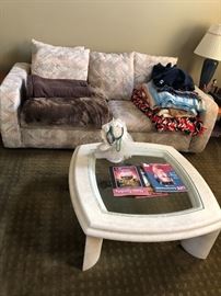 Sofa, blankets and coffee table