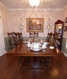 Trestle dining table includes 2 leaves, 6 chairs