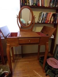 young ladies make-up jewelry table with mirror