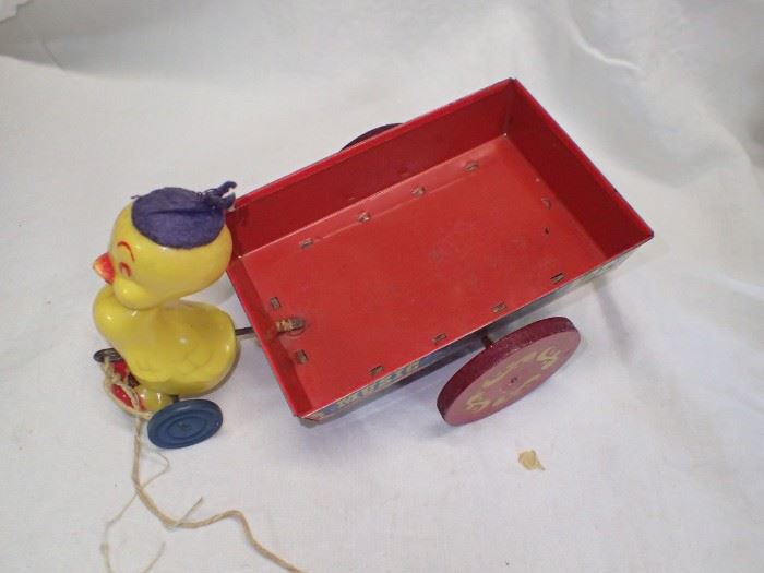 YELLOW DUCK W/ DELIVERY WAGON RED METAL Vintage Easter Mattel Tin Wagon . Duck . Delivery Wagon . Music Box . Plastic Duck . Pull Toy
