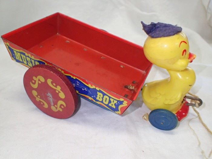 YELLOW DUCK W/ DELIVERY WAGON RED METAL Vintage Easter Mattel Tin Wagon . Duck . Delivery Wagon . Music Box . Plastic Duck . Pull Toy
