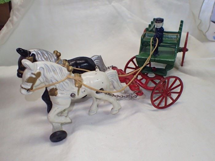 CAST IRON HORSES AND CART W/ DRIVER