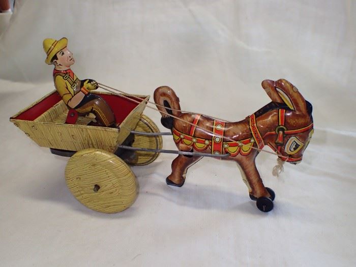 1940s MARX DONKEY CART AND DRIVER TIN WIND UP TOY