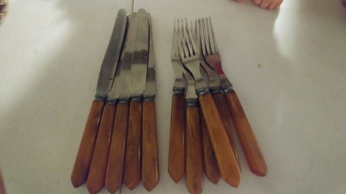 BAKELITE KNIVES AND FORKS