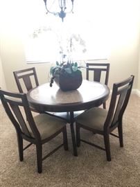 48” Dining table with four upholstered chairs 