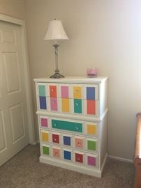 Colorful high boy dresser
