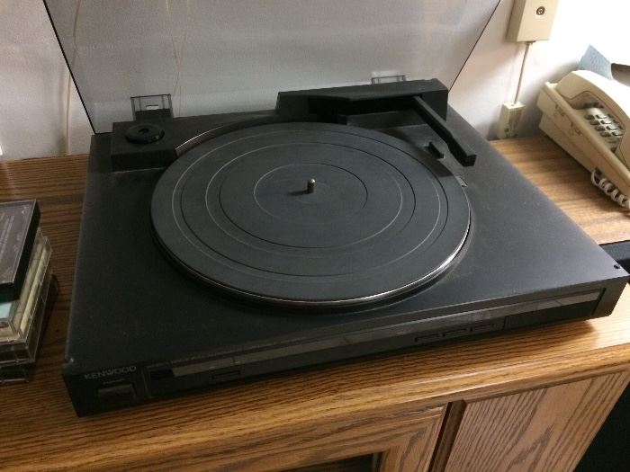 Turntable is part of the Kenwood Stereo System.