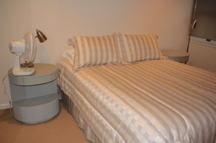 Bed with Round Side Table, Table Fan and Lamp 