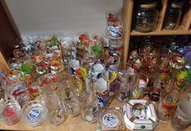 Assorted collectible restaurant glasses ...Smurfs...Heroes...Superman...Peanuts and others...