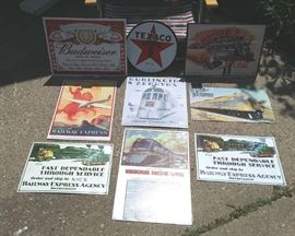 Assorted tin signs