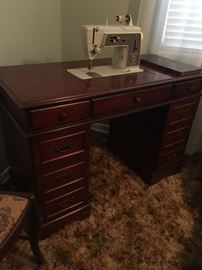 Sewing machine and desk