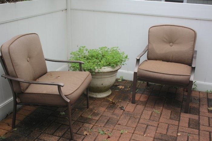 Pair of Outdoor Chairs and Cushions with Potted Plant and Urn