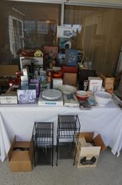 Table full of new and new vintage appliances, kitchen ware, serving pieces.....all could be used as gifts