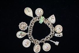 14k gold charm bracelet with stones!