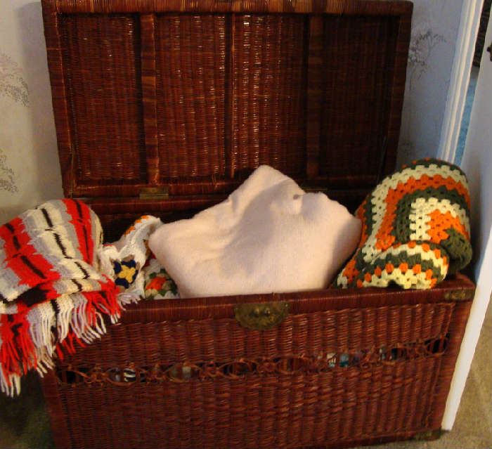 Wicker Trunk, Afghans and Blankets. Lots of them throughout the house