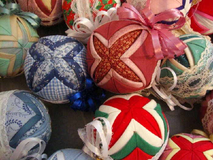 A lot of Handmade quilted Christmas Ornaments
