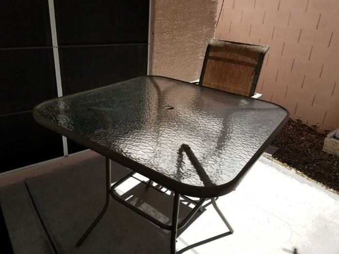 Bar height patio table and 1 tall chair