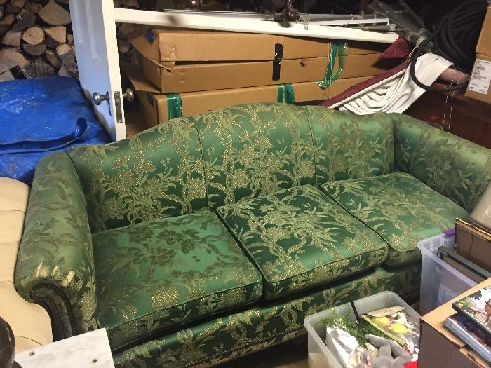 green damask upholstered sofa