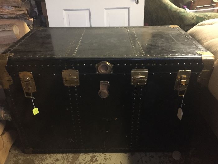 antique black metal trunk from the Charles T. Fisher estate