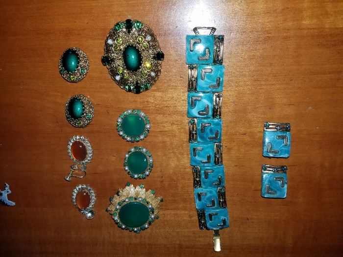 The earrings and Brooch in the second row from the left on the bottom is from Jewelry by Robert. A fine set. The Bracelet on the right and the earrings are another fabulous find. Bring your money!