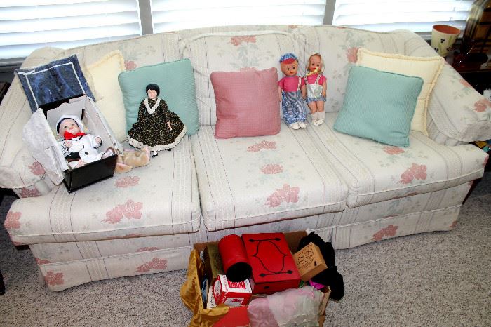 Upholstered sofa, dolls, vintage magic items
