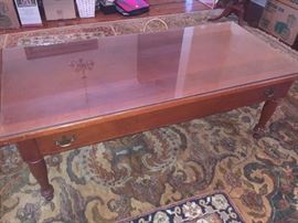 several coffee tables and end tables and do you notice the fabulous rug?