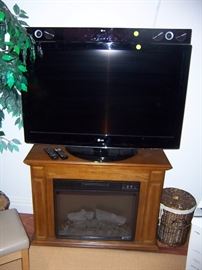 LG TV ON  ELECTRIC FIRE PLACE