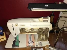 Singer Sewing Machine, have the original owners manual and attachments