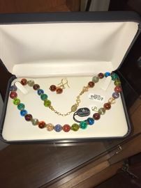Murano Glass, strung with 14K gold, original cost $453.00