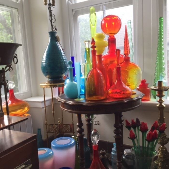 Mid-century modern Blenko art glass, glass flowers, brass pedestals and candlesticks.