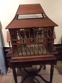 Antique Victorian bird cage with original, custom-fit wooden table stand. 