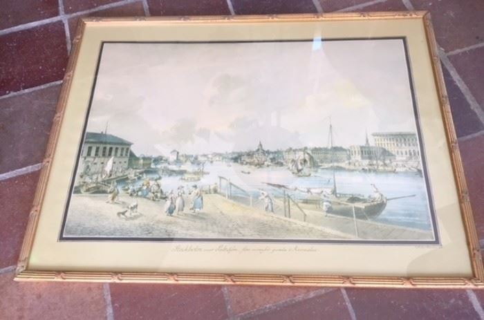 Gilt-framed print depicting the Gamla Stan area of Stockholm, Sweden. 