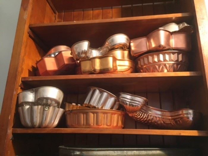 Contemporary copper and aluminum kitchen molds. 