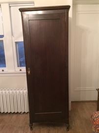 Tall wood cabinet, probably Chinese. 