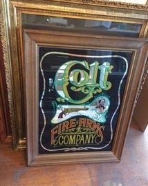 Framed "Colt Fire Arms Company" wall hanging.