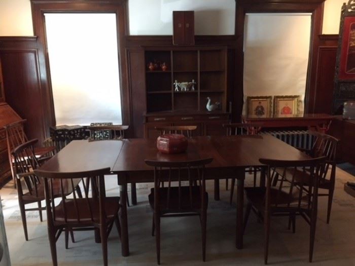 Mid-century modern Willet Trans-Asia solid cherry dining room table with leaves and 9 chairs.  In the background, Willet Trans-Asia display cabinet atop what is probably a Willet sideboard. In our first floor dining room. 