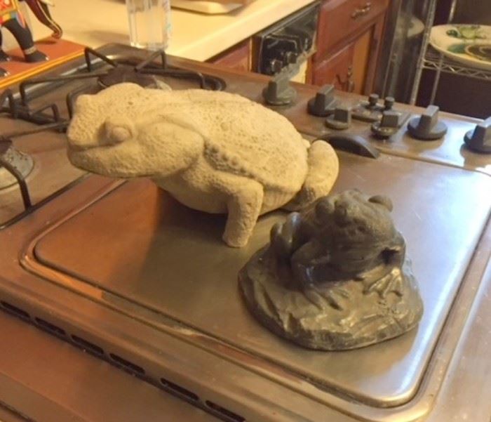 Concrete frogs in the kitchen. 
