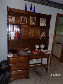 another Bookcase Desk,  Bible Video Set, several movie Sets of videos,  another vintage Land Line Telephone with big numbers,  misc. - upstairs main level 