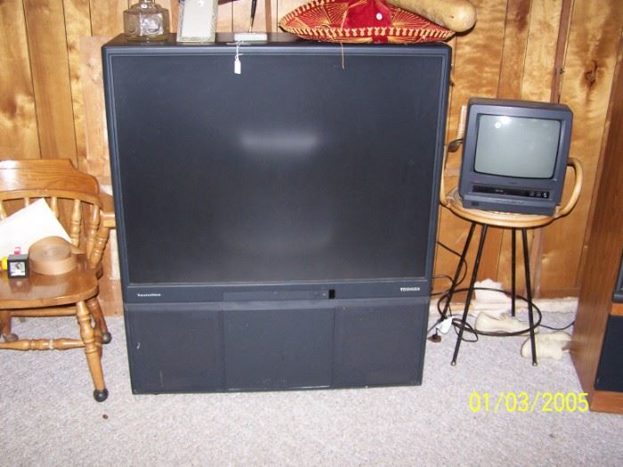 BIG Screen TV -  in good working condition and it has rollers for easy moving, Red Sombrero, Stool , small TV, wooden Chair - Basement