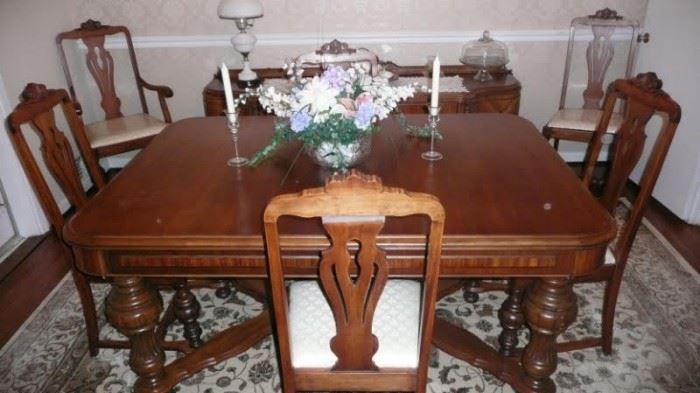 Antique dining set you will have to see to believe! 